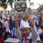 PICS: From schools to temples: winning hearts and minds to end bear bile farming in Vietnam