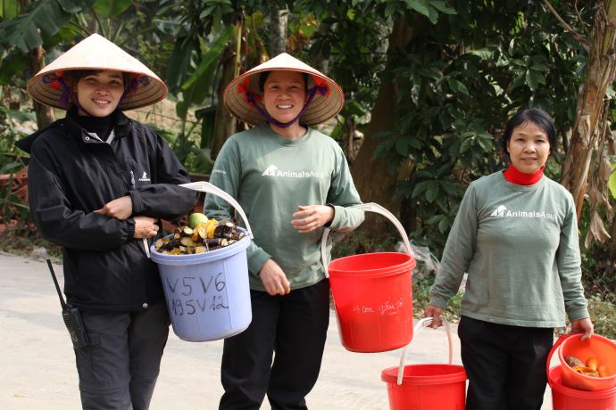 women with buckets